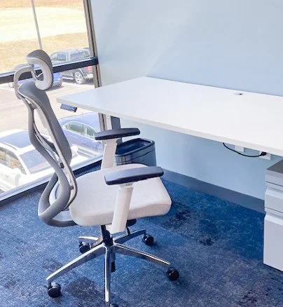 Ergonomic office chair with headrest.